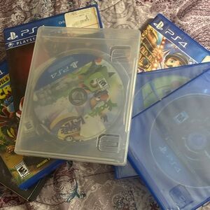 Sony PS4 Game Set with Blue and Clear Cases 7 games